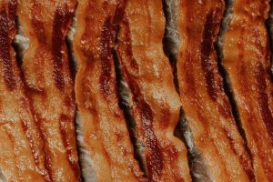 Does Slutty Vegan sell bacon