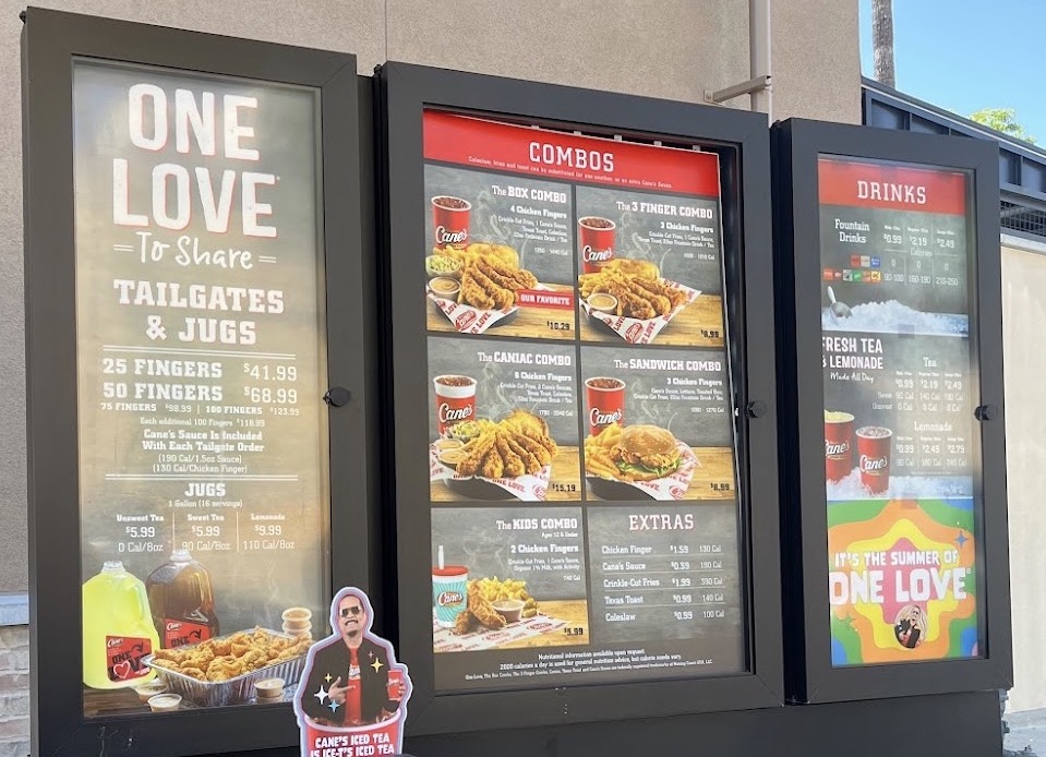 Raising Cane menu board featuring the One Love meal.