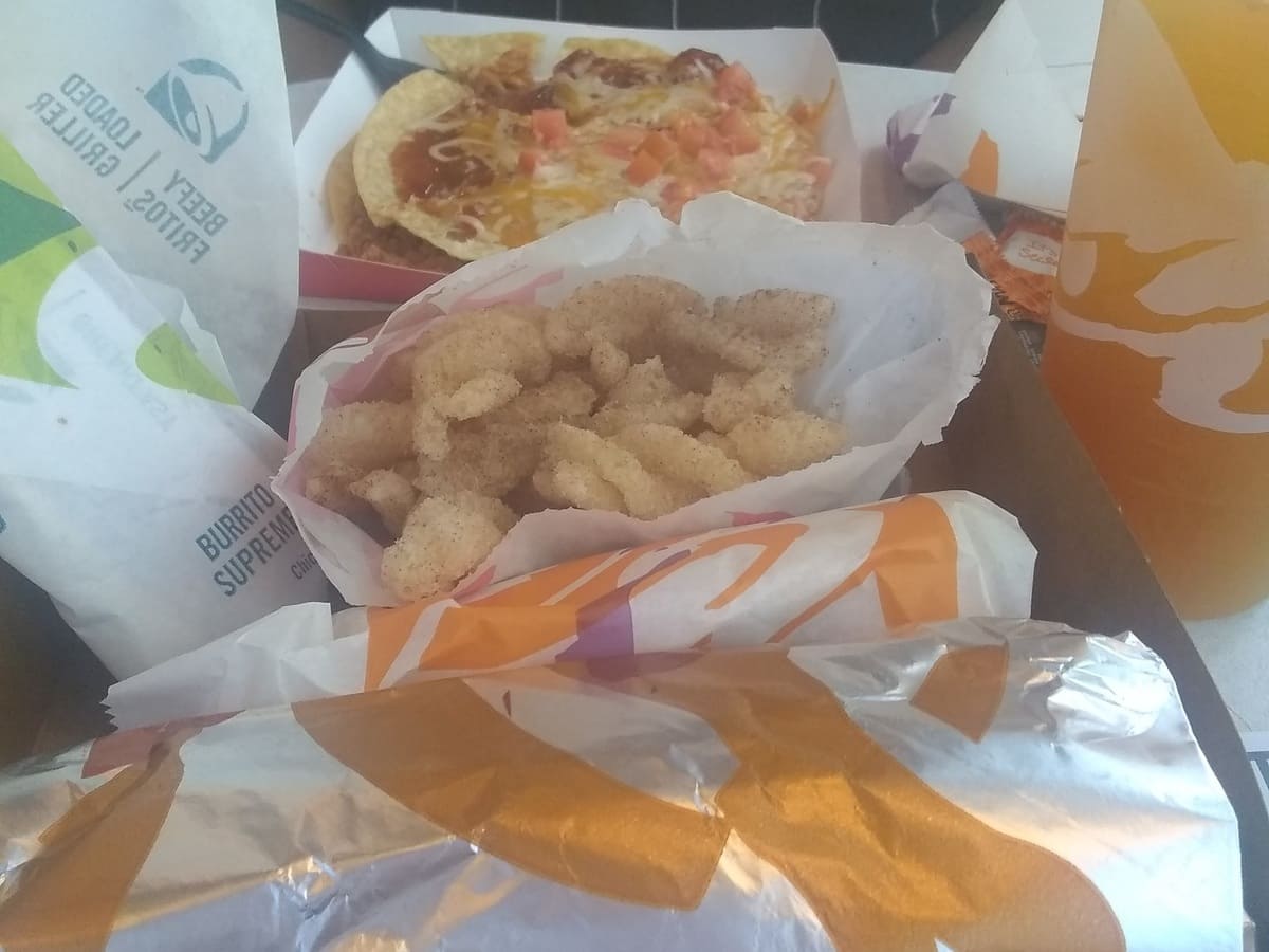 A Taco Bell cravings box on a table.